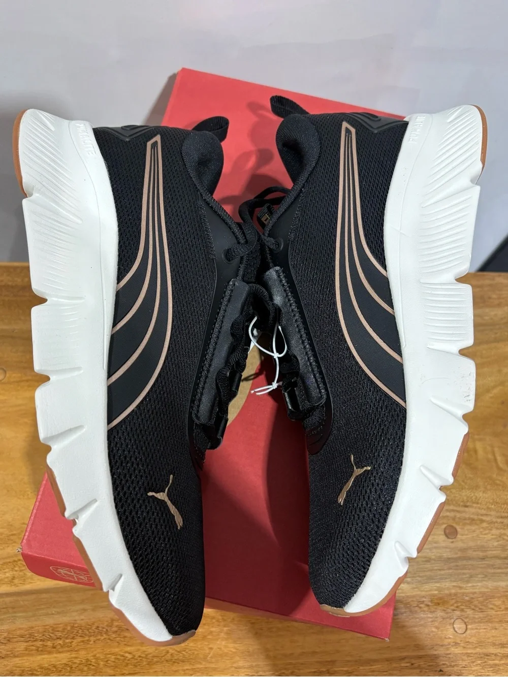 Puma Black and Rose Gold Focus Lite Sneaker Womens 8.5